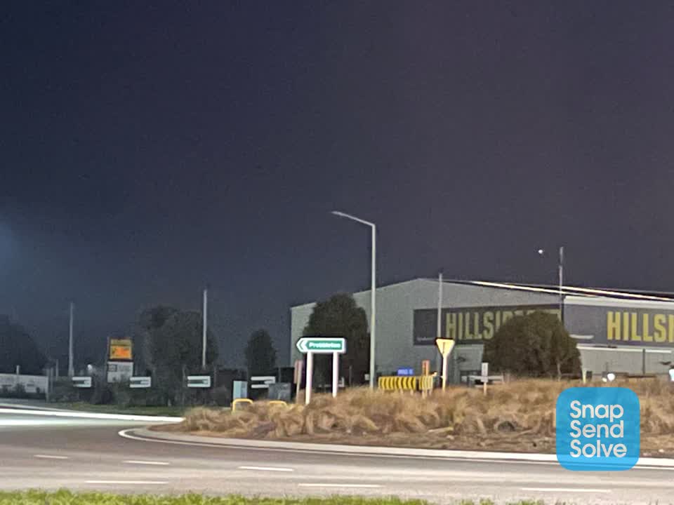 The photograph attached to this street light outage report