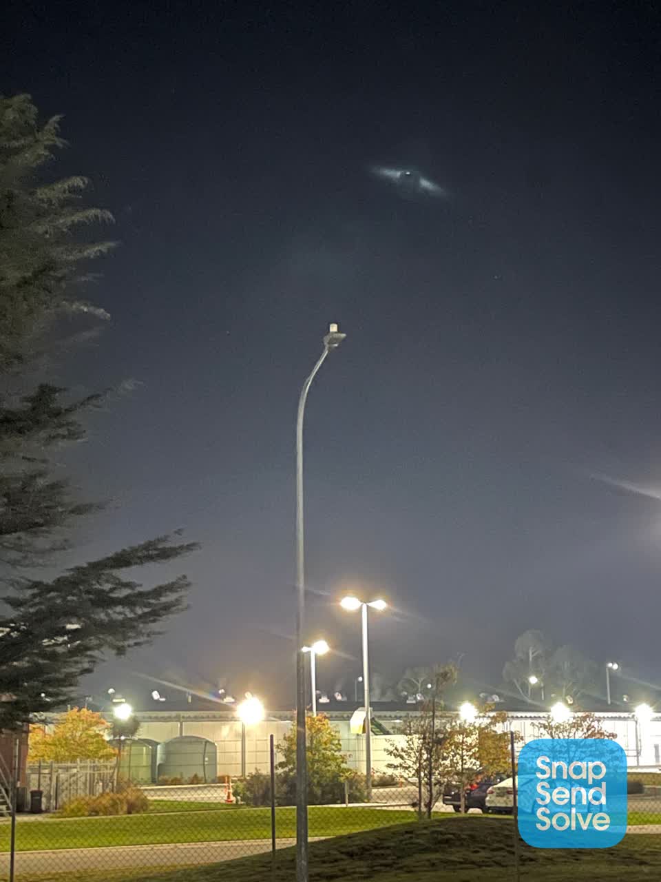 The photograph attached to this street light outage report