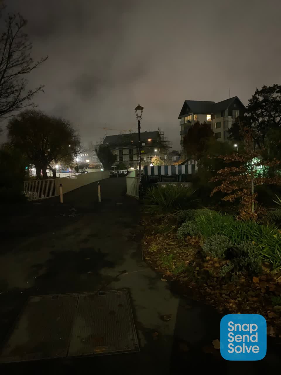The photograph attached to this street light outage report