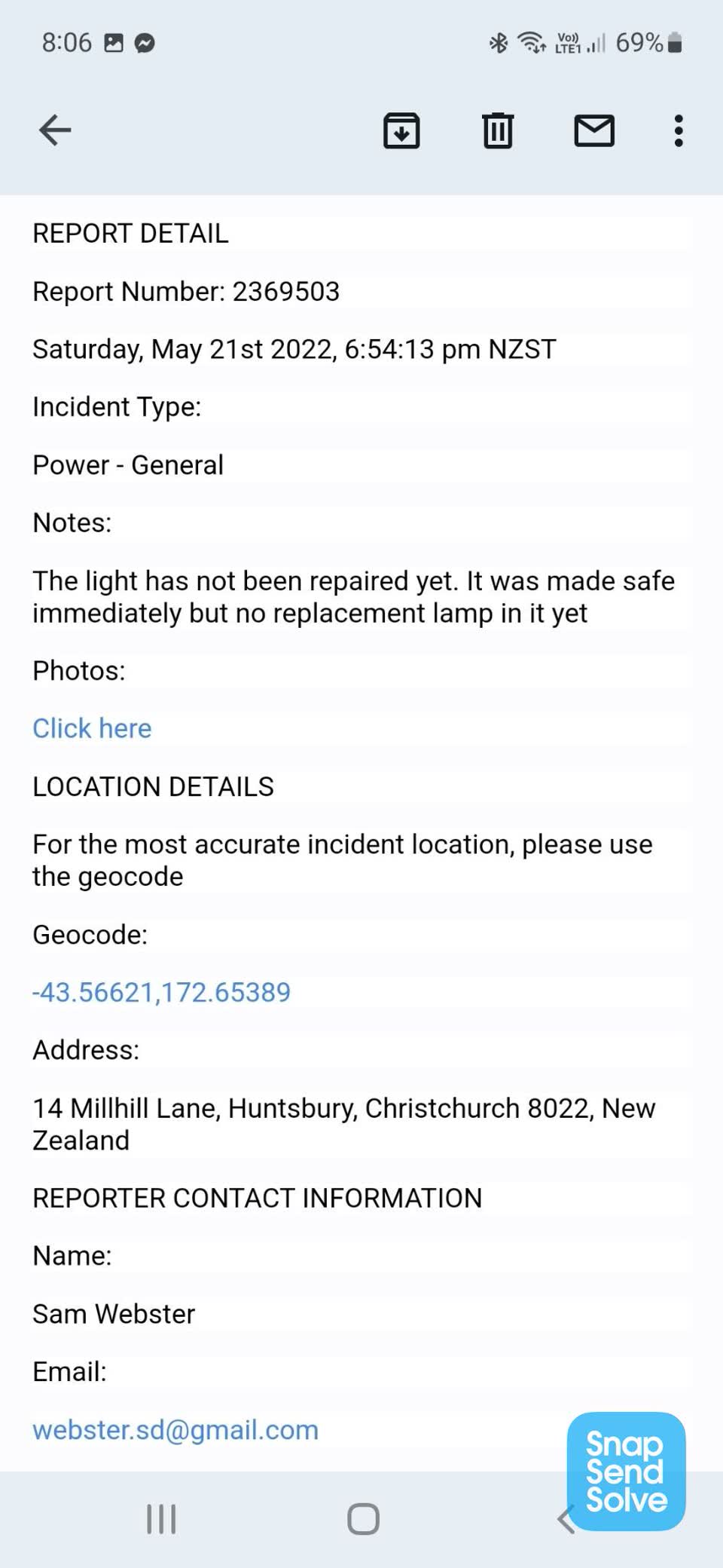 The photograph attached to this street light outage report