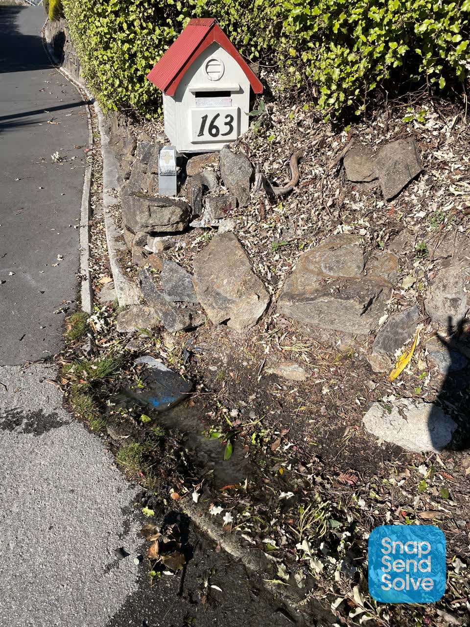 The photograph attached to this water leak report