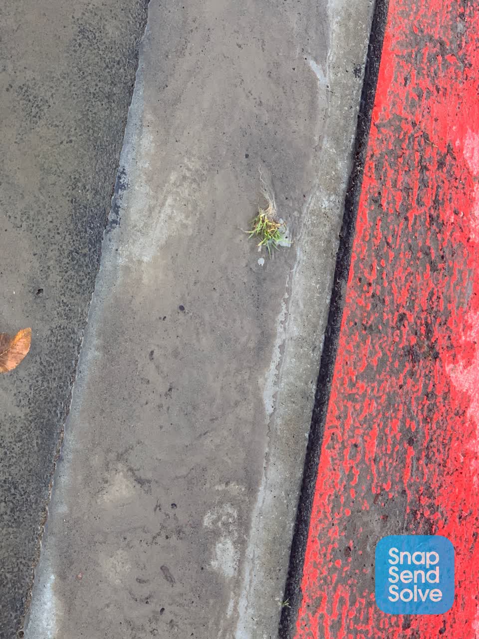 The photograph attached to this water leak report