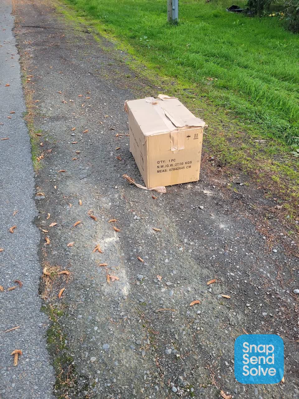 The photograph attached to this rubbish/recycling report