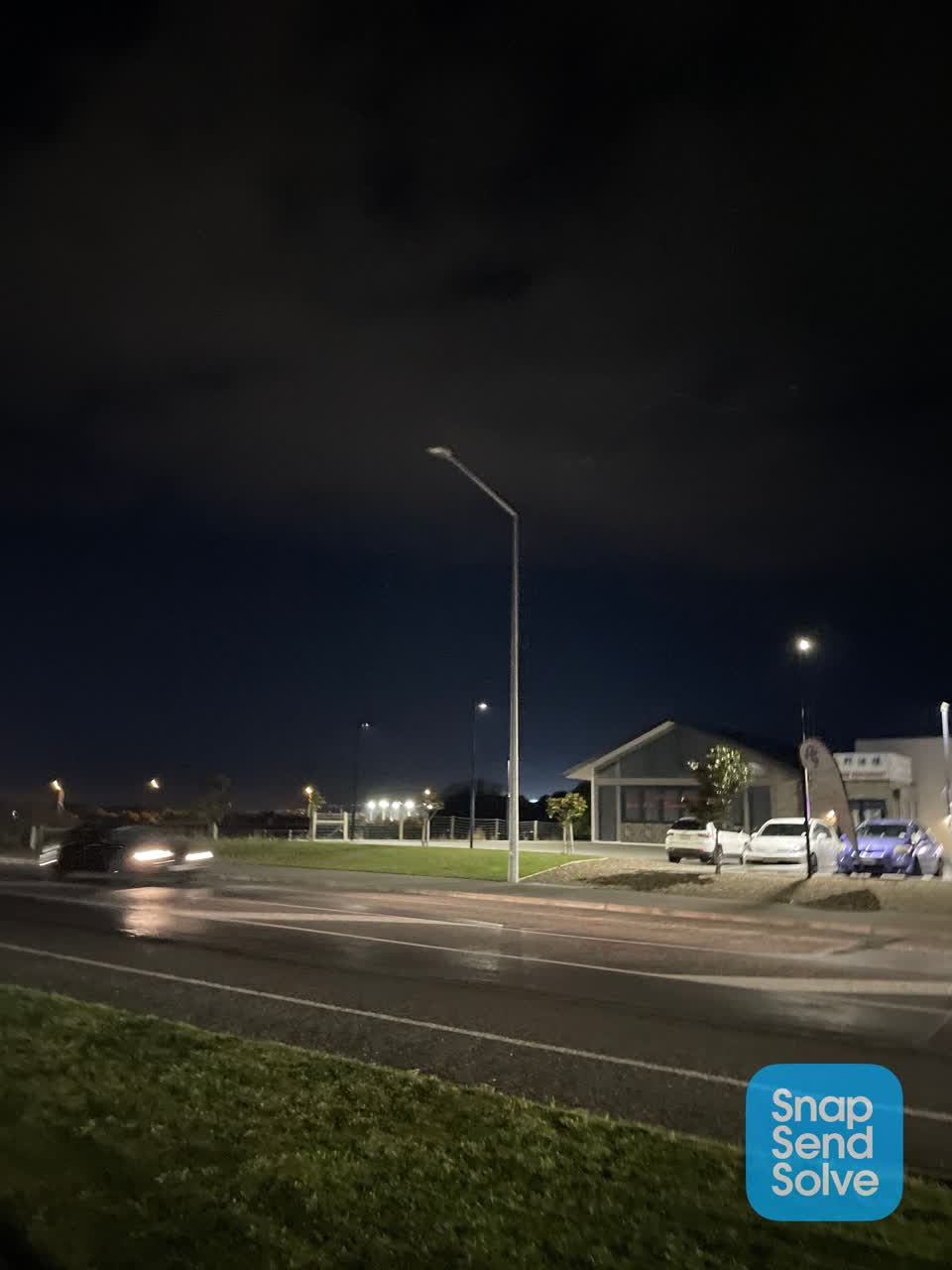 The photograph attached to this street light outage report