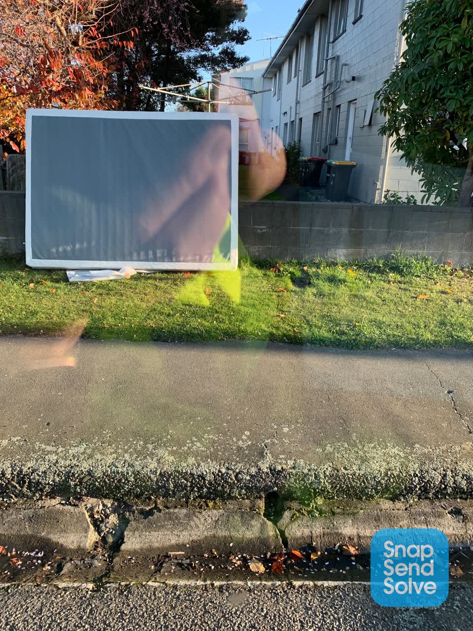 The photograph attached to this rubbish/recycling report
