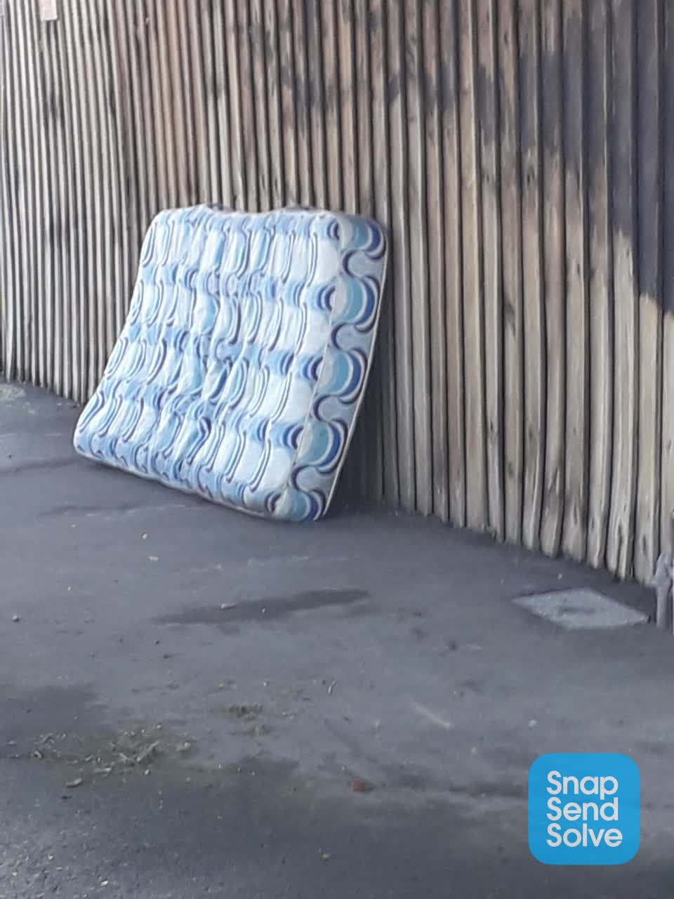 The photograph attached to this rubbish/recycling report