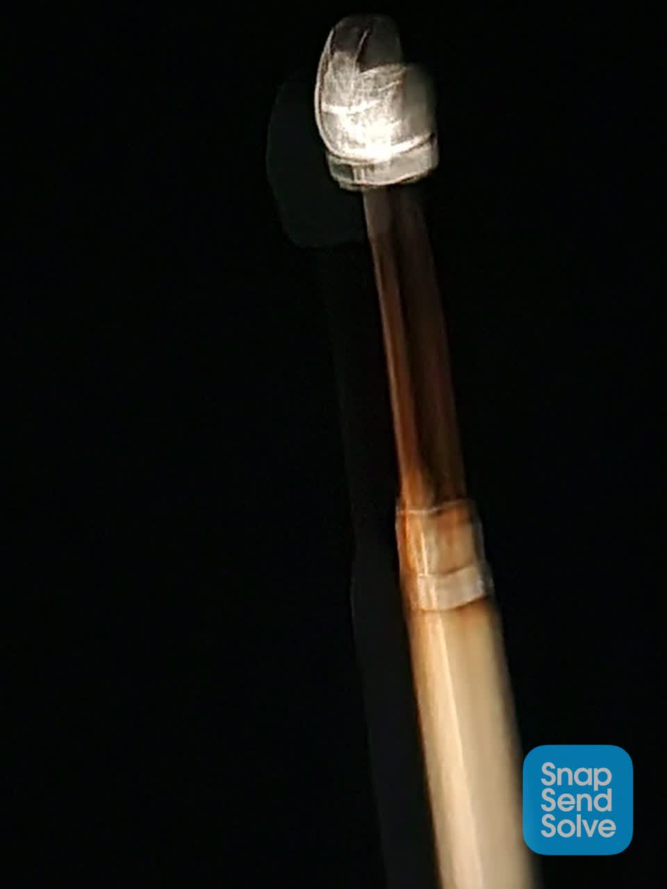 The photograph attached to this street light outage report
