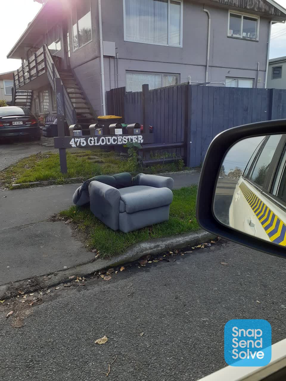 The photograph attached to this rubbish/recycling report
