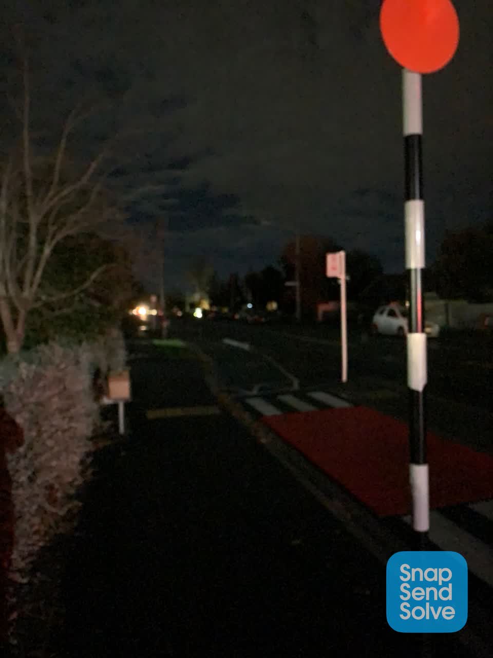 The photograph attached to this street light outage report