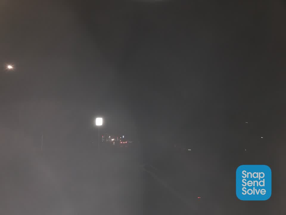 The photograph attached to this street light outage report
