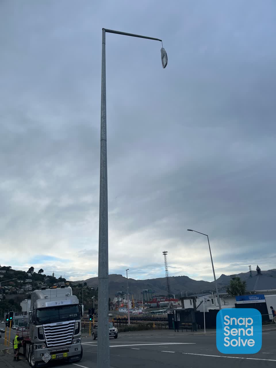 The photograph attached to this street light outage report
