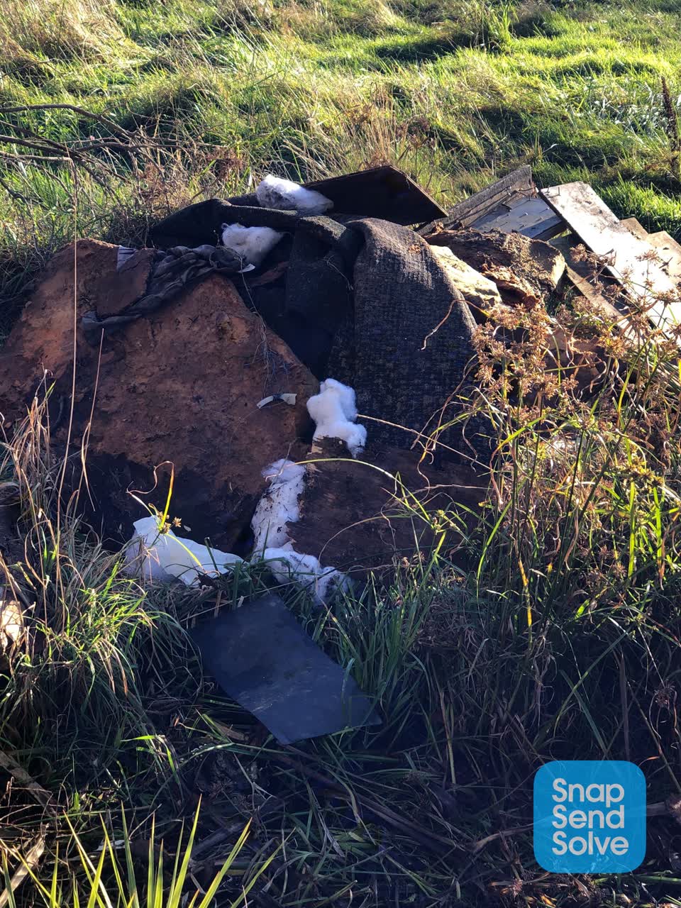 The photograph attached to this rubbish/recycling report