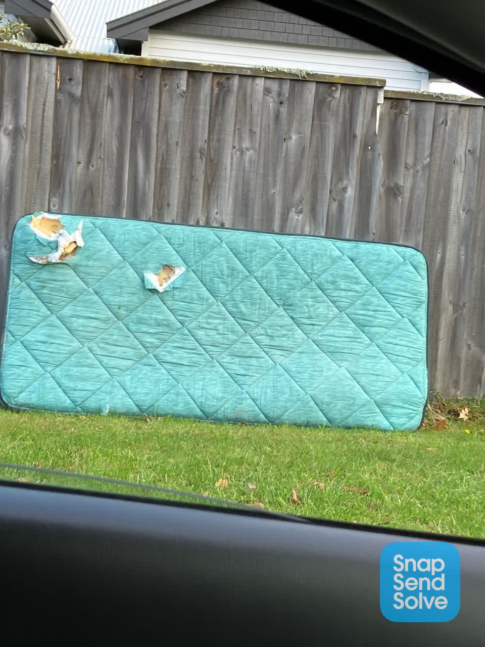 The photograph attached to this rubbish/recycling report