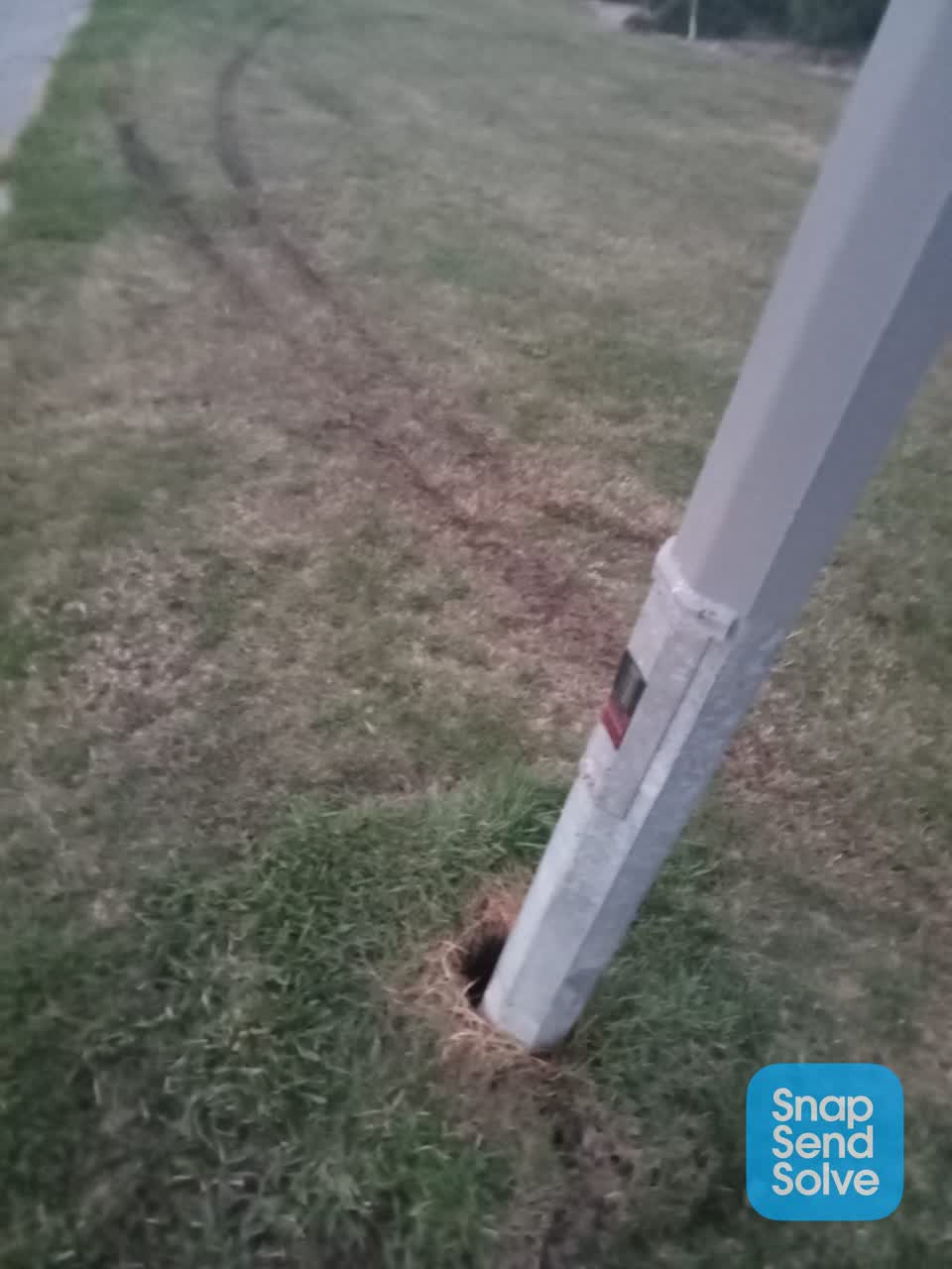The photograph attached to this street light outage report