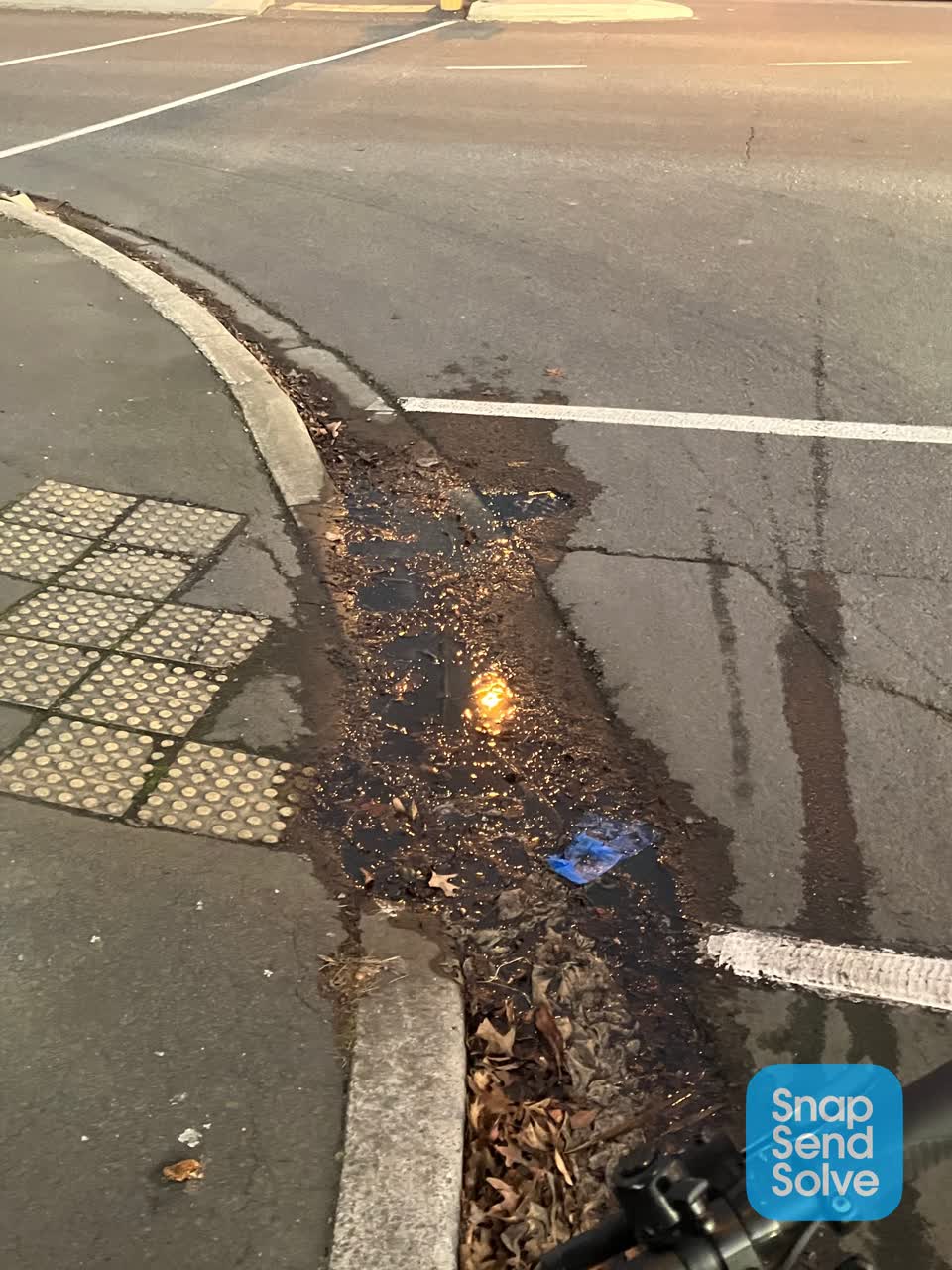 The photograph attached to this water leak report