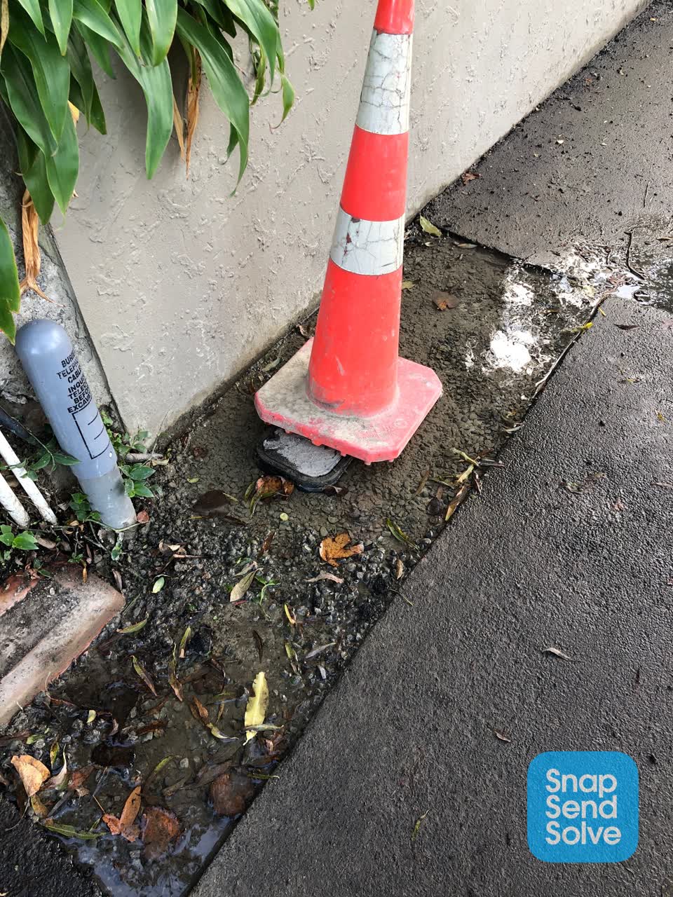 The photograph attached to this water leak report