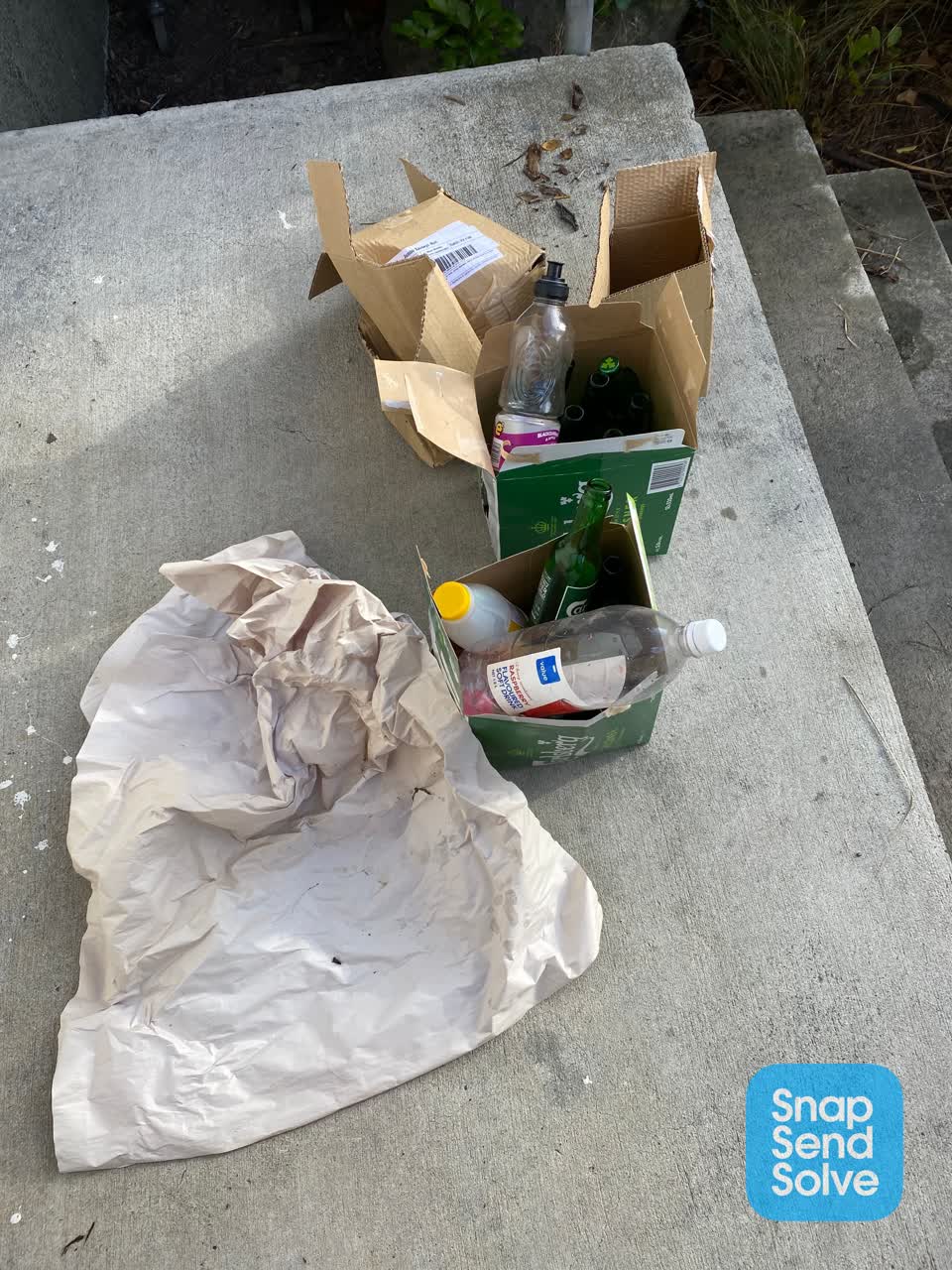 The photograph attached to this rubbish/recycling report
