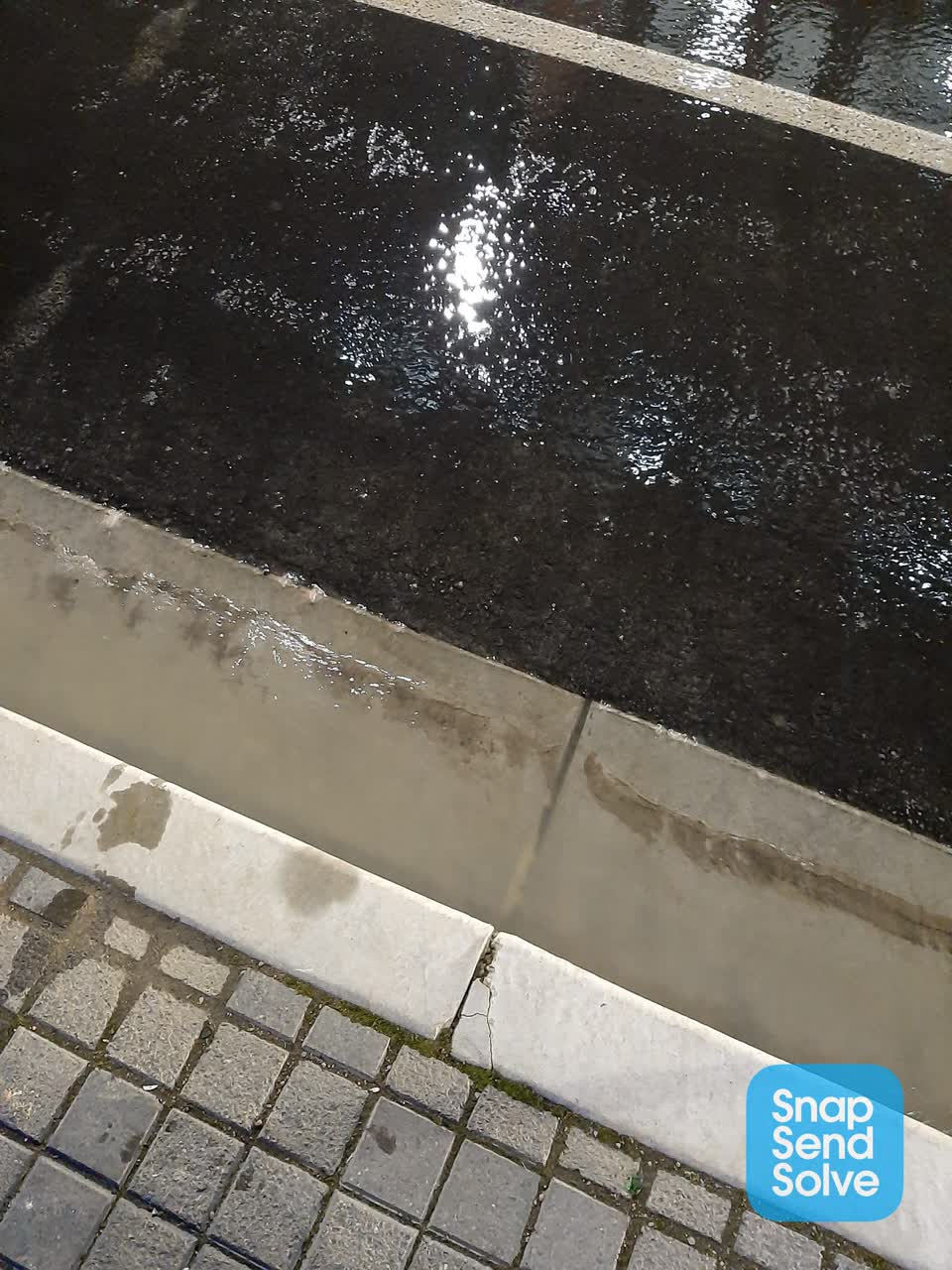 The photograph attached to this water leak report