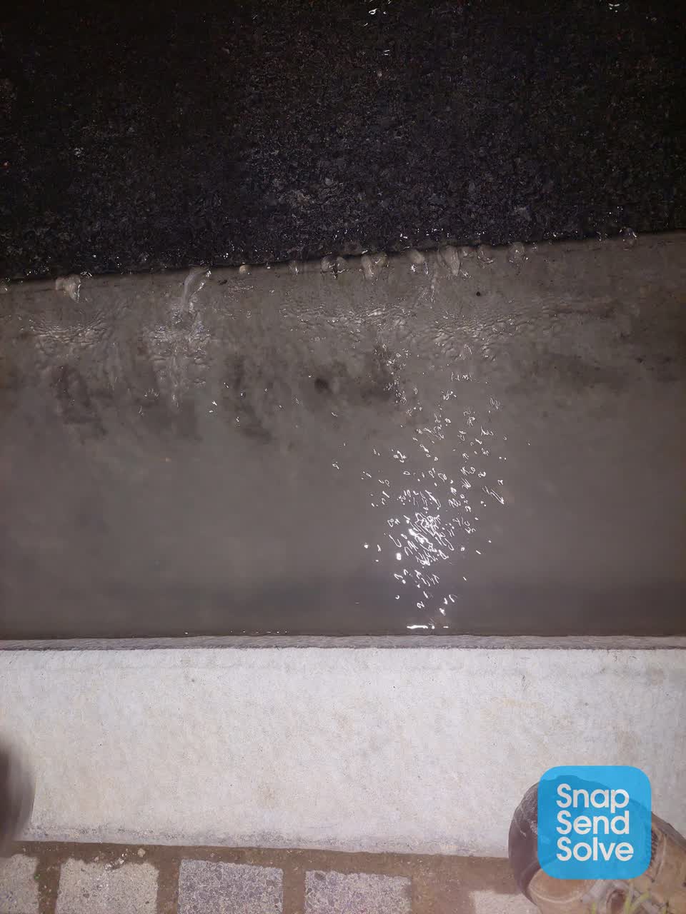 The photograph attached to this water leak report