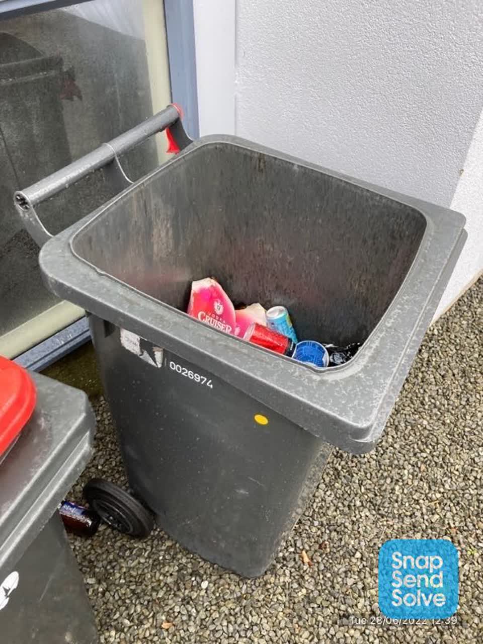 The photograph attached to this rubbish/recycling report