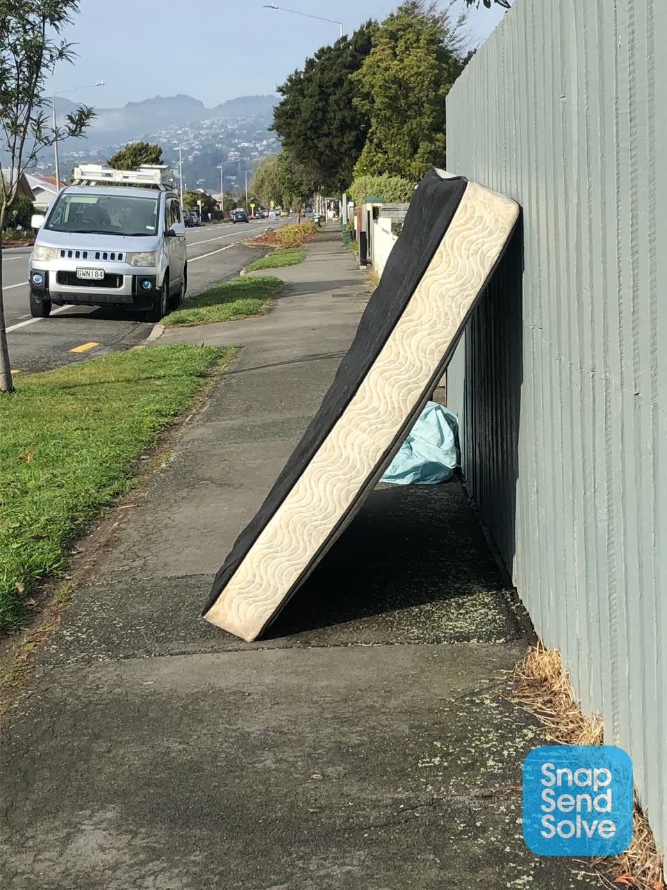 The photograph attached to this rubbish/recycling report