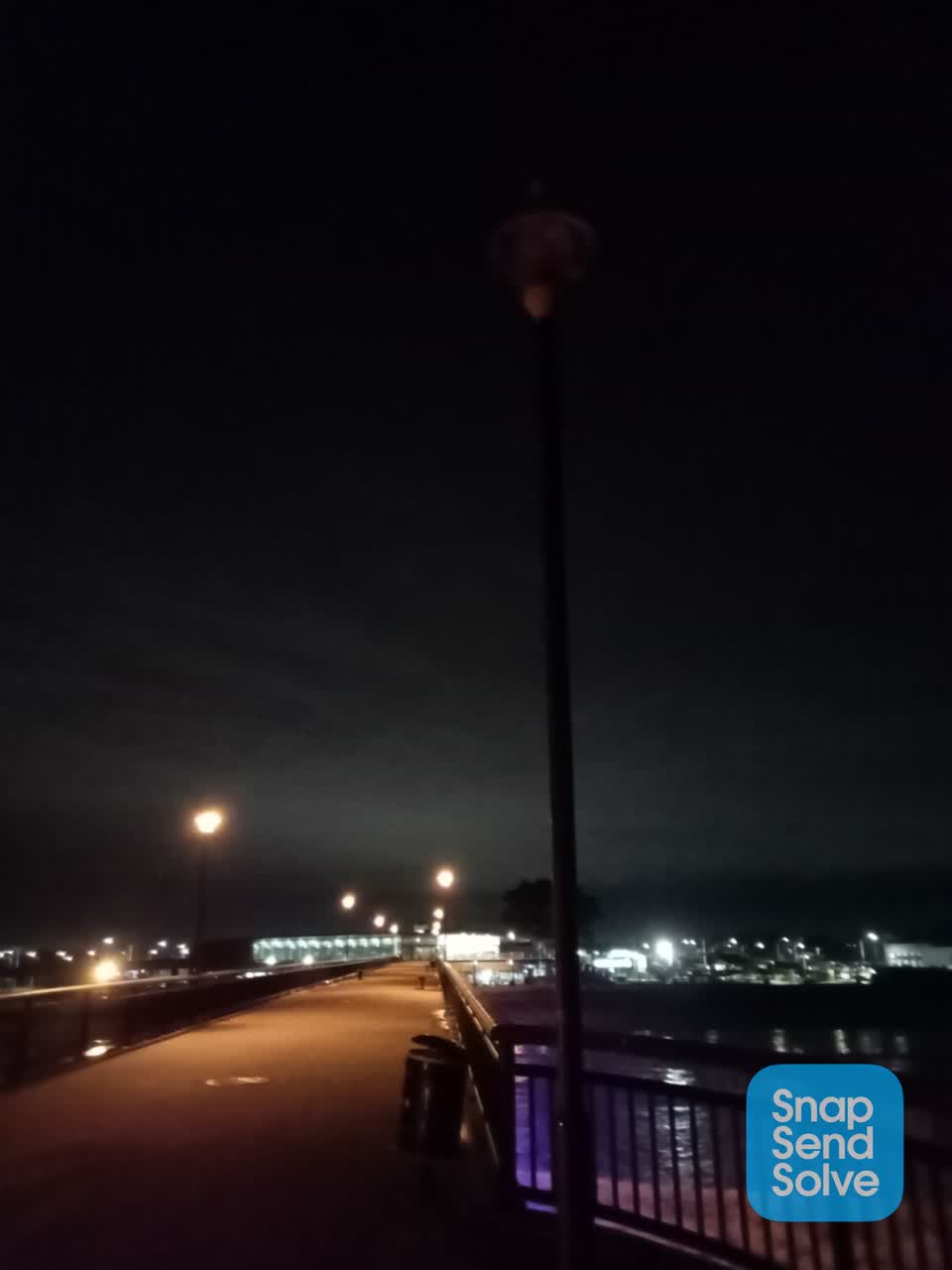 The photograph attached to this street light outage report
