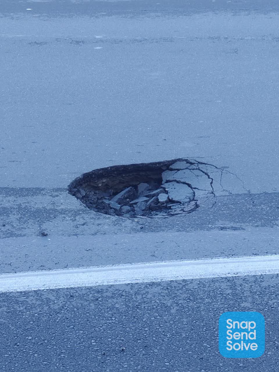 The photograph attached to this roading/streets report