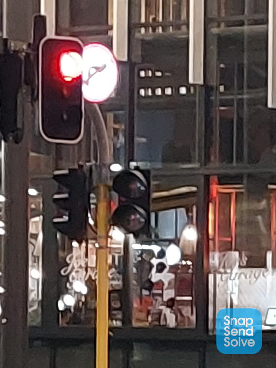 The photograph attached to this street light outage report