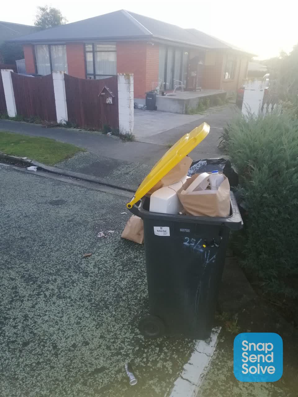 The photograph attached to this rubbish/recycling report