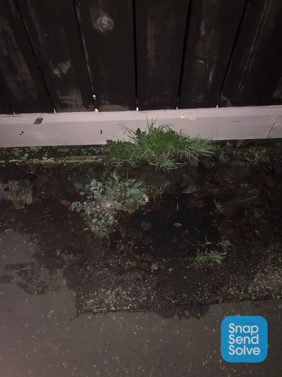 The photograph attached to this water leak report