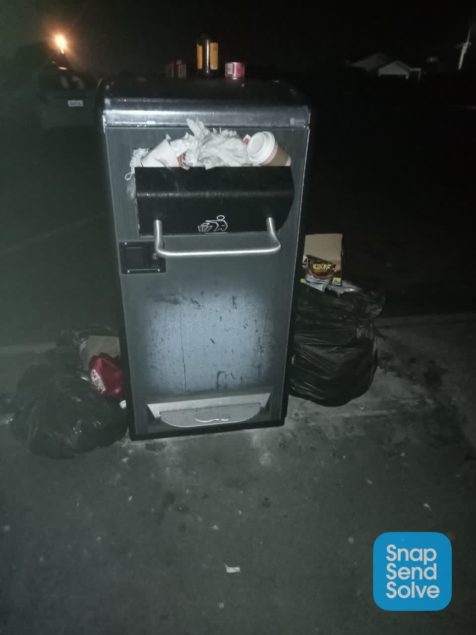 The photograph attached to this rubbish/recycling report