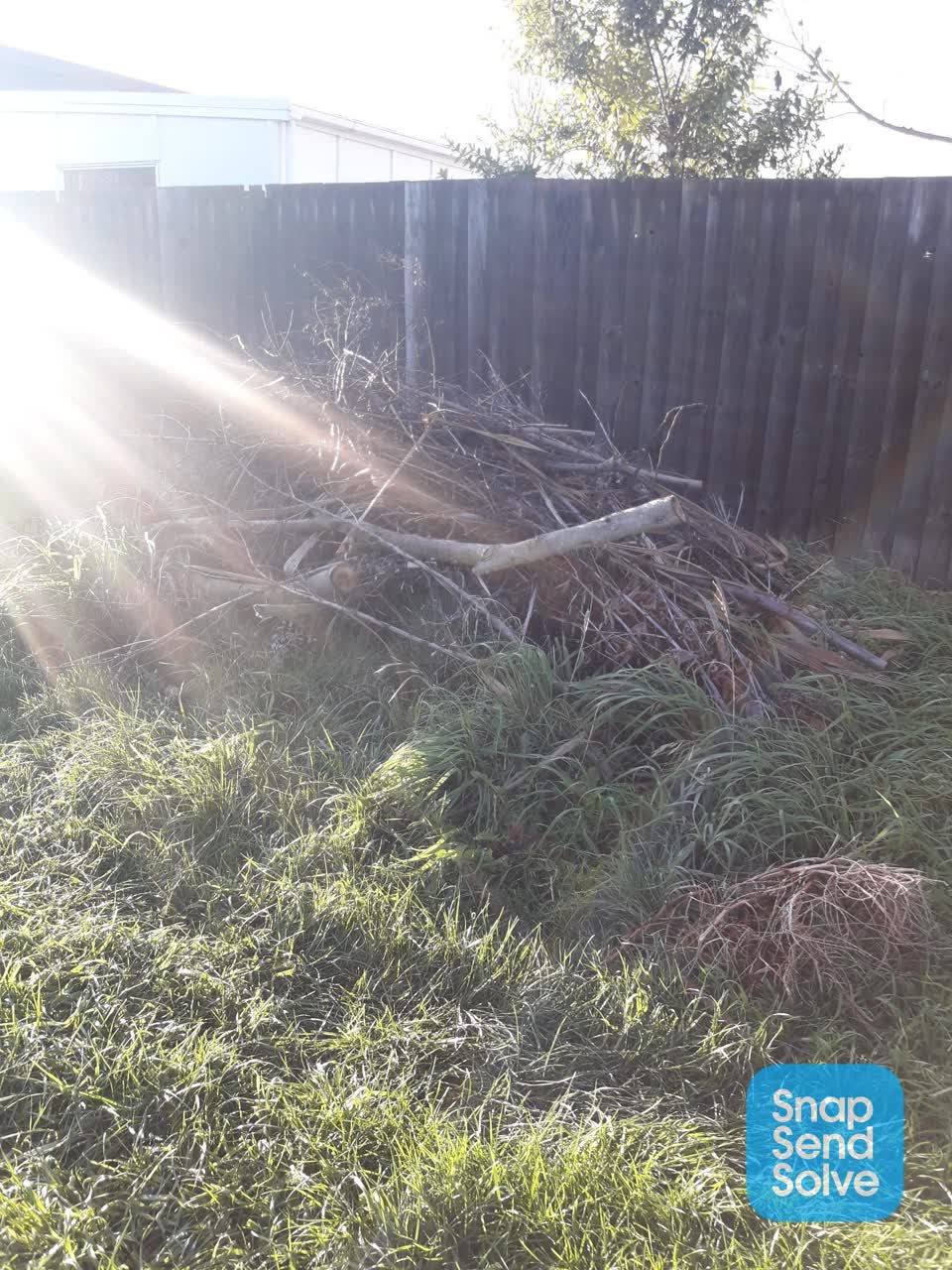 The photograph attached to this rubbish/recycling report