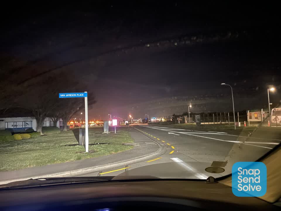 The photograph attached to this street light outage report