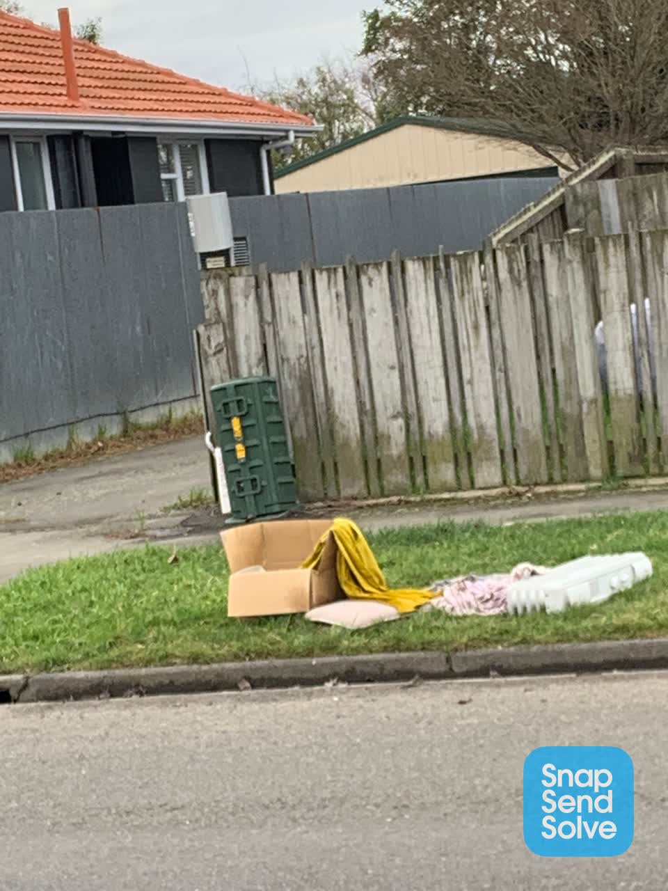The photograph attached to this rubbish/recycling report