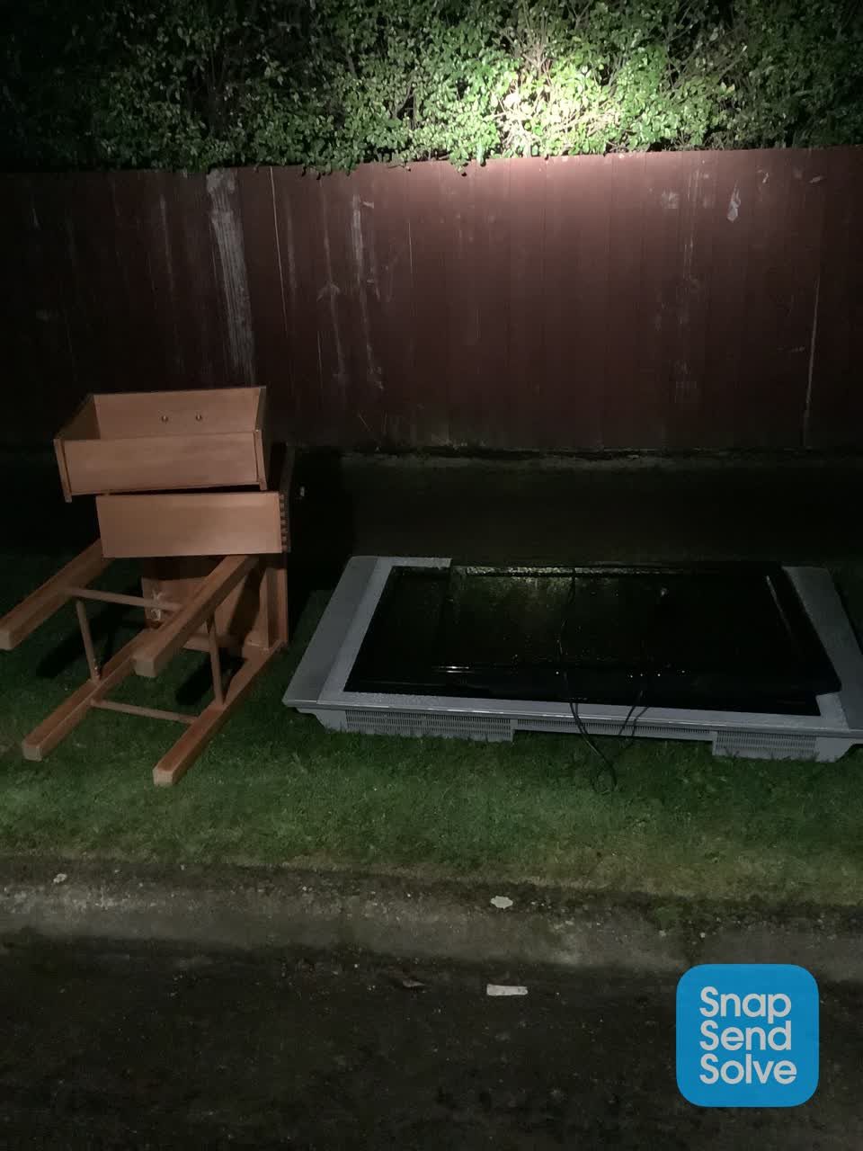 The photograph attached to this rubbish/recycling report