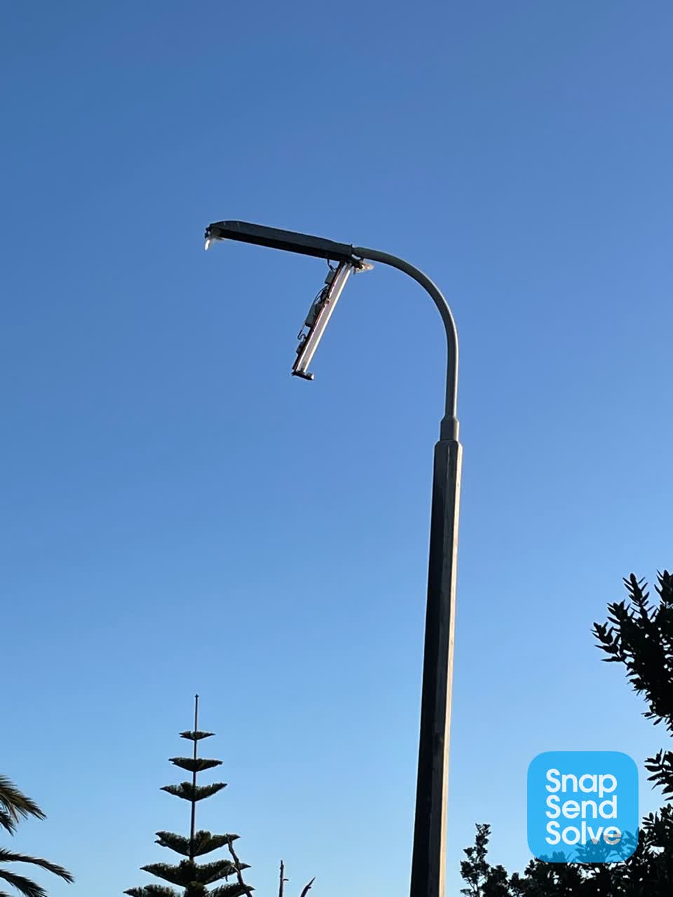 The photograph attached to this street light outage report