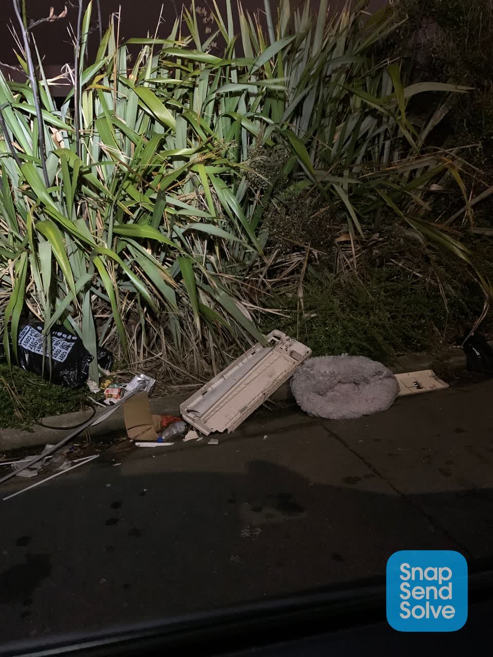 The photograph attached to this rubbish/recycling report
