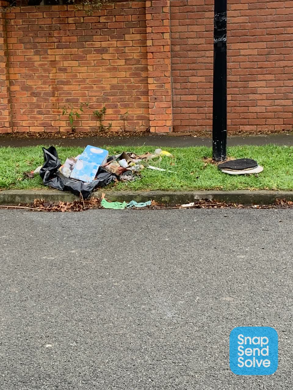 The photograph attached to this rubbish/recycling report