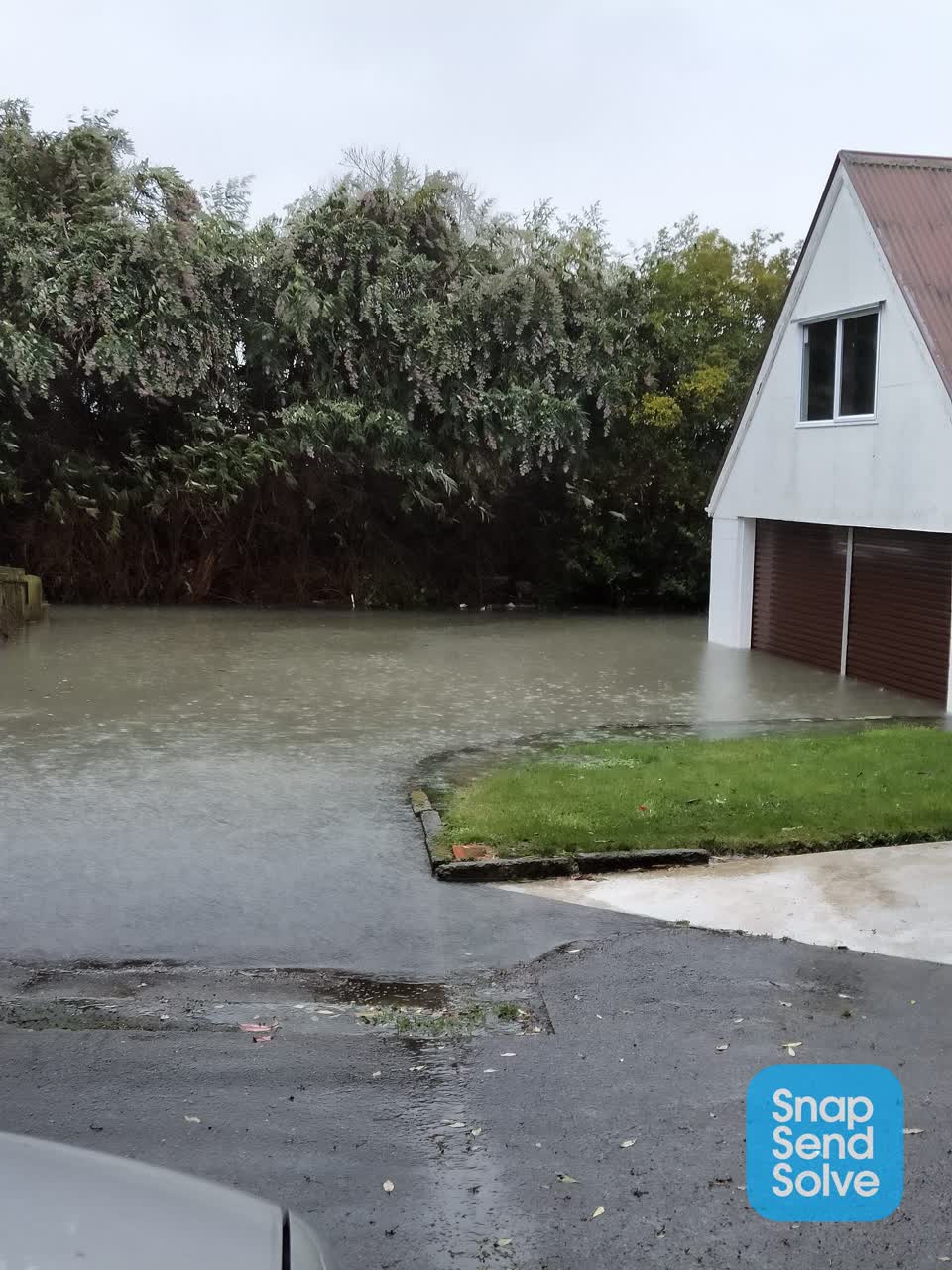 The photograph attached to this flooding report