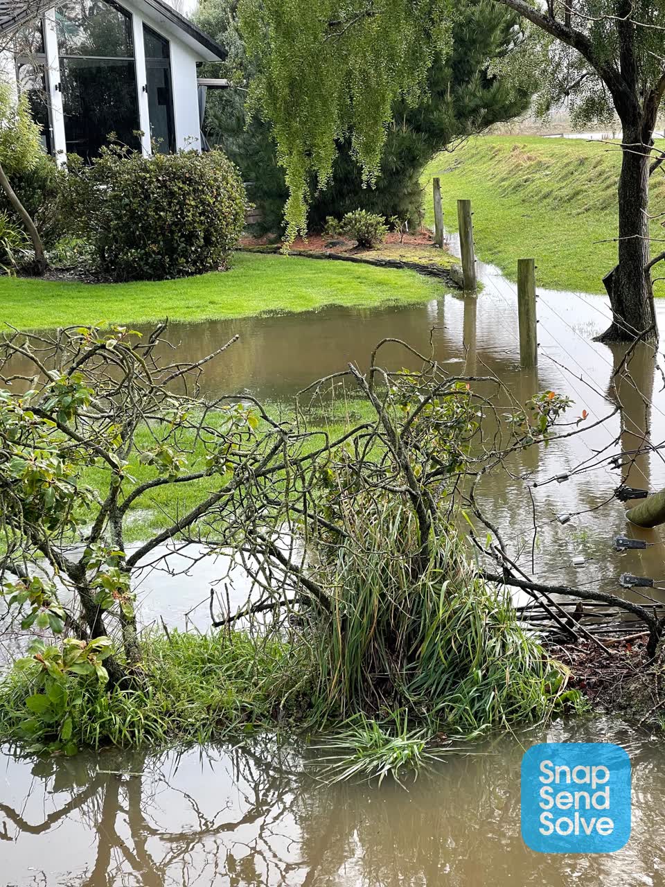 The photograph attached to this flooding report