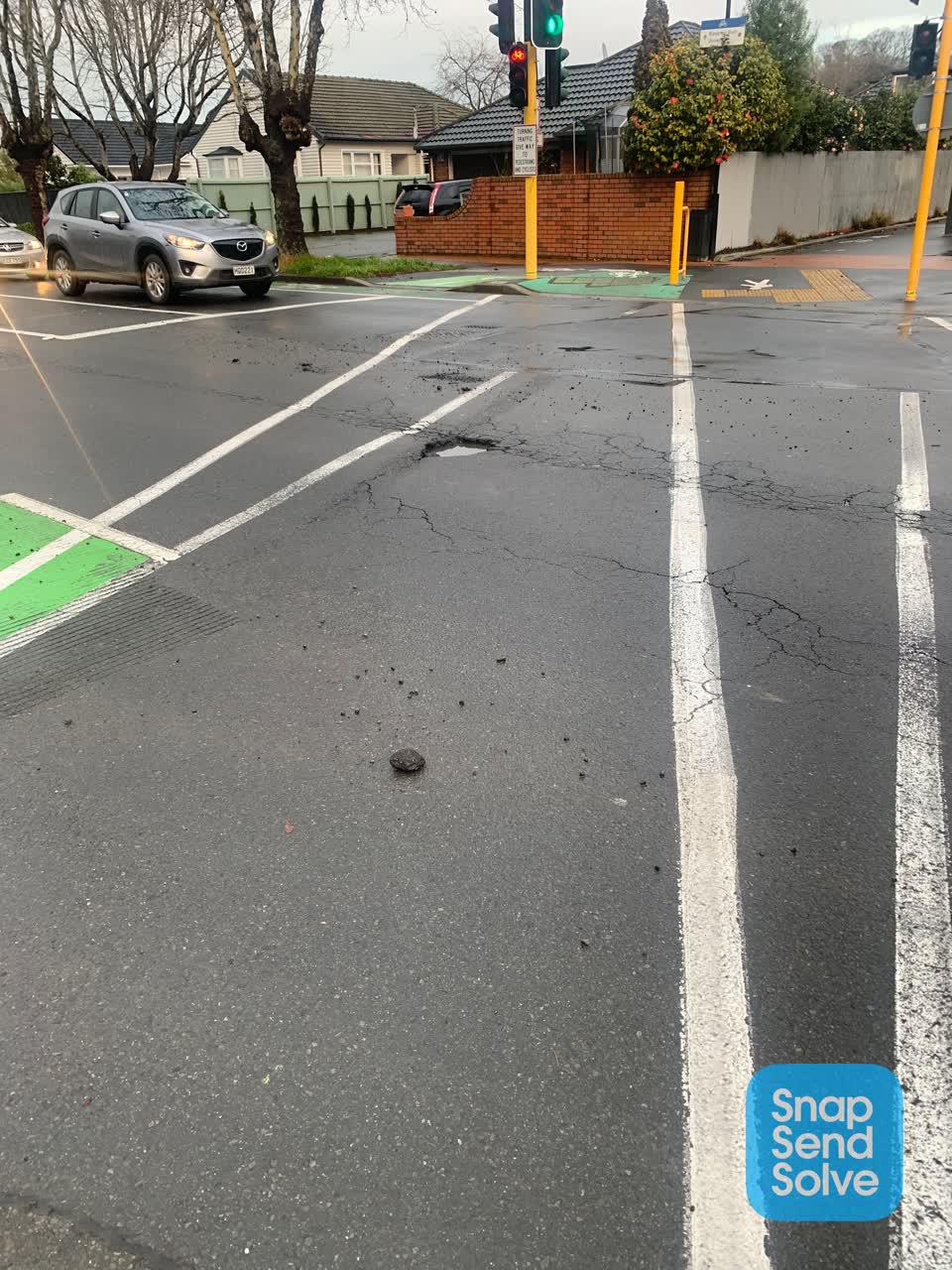 The photograph attached to this pothole report