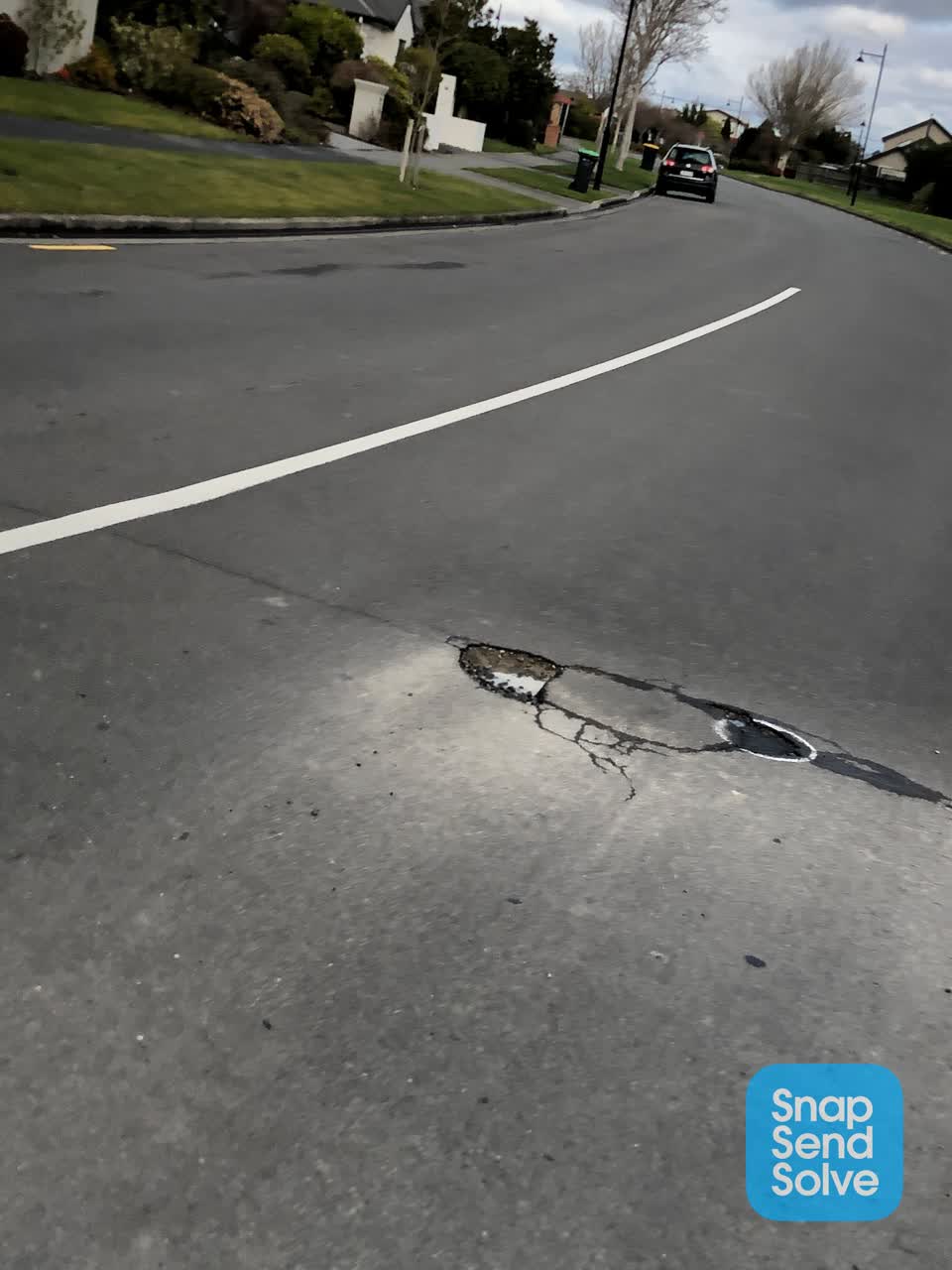 The photograph attached to this pothole report