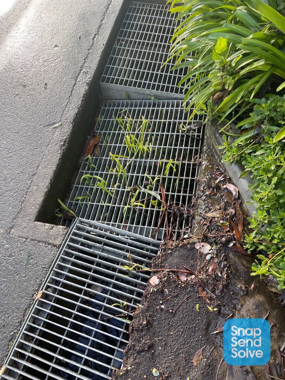 The photograph attached to this street gutters / storm water report