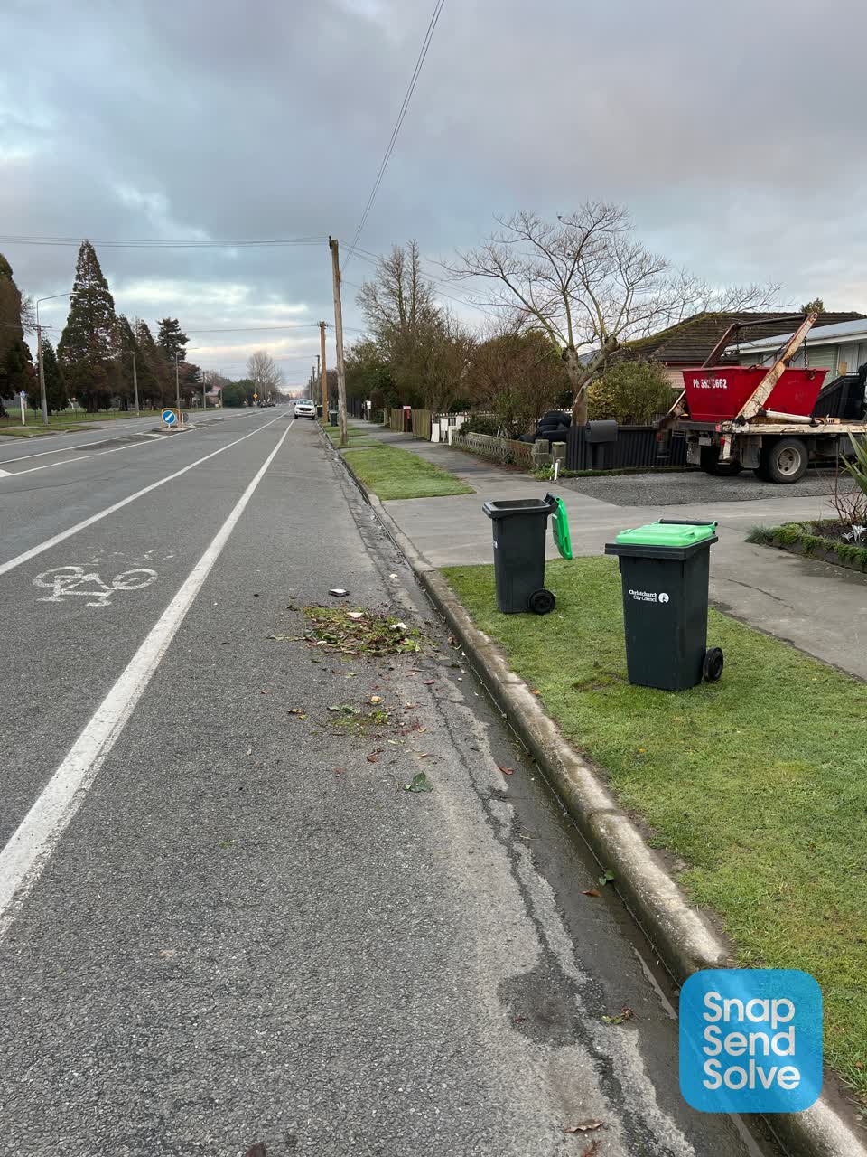 The photograph attached to this rubbish and bins - general report