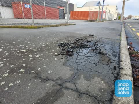 Pavement - Damaged — a report photo
