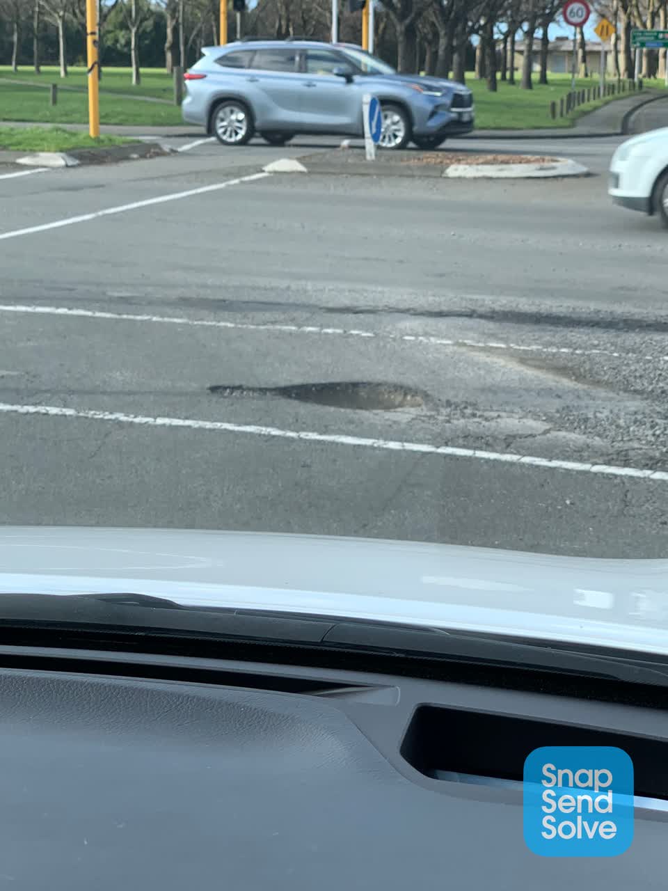 The photograph attached to this pothole report