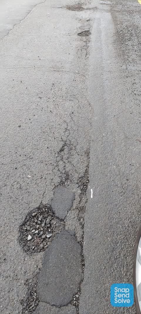 Pothole, a report photo