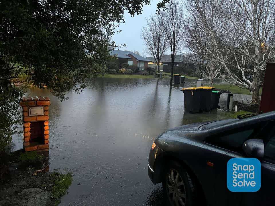 The photograph attached to this flooding report