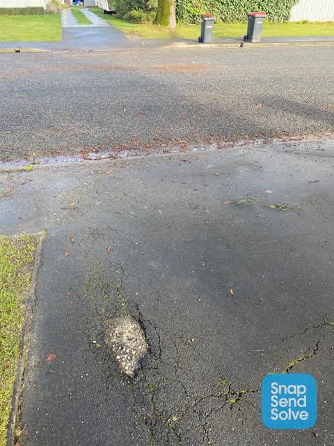 Pavement - Damaged — a report photo