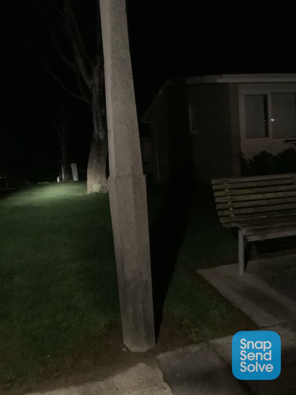 The photograph attached to this street light outage report
